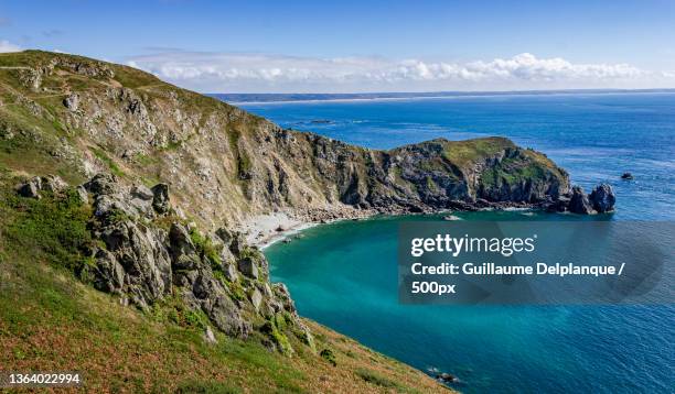 nez de jobourg,scenic view of sea and mountains against sky,la hague,france - manche bildbanksfoton och bilder