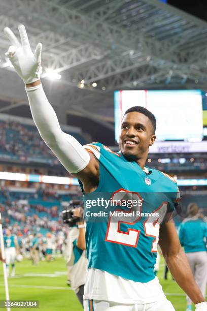 Byron Jones of the Miami Dolphins waves to the crowd after defeating the New England Patriots 33-24 at Hard Rock Stadium on January 09, 2022 in Miami...