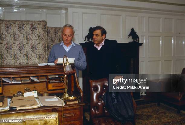 View of American film director James Ivory and Indian-born British film producer Ismail Merchant on the set of their film 'Maurice,' London, England,...