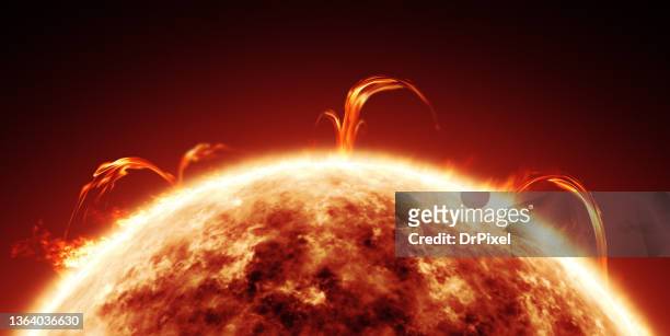 sun close-up showing solar surface activity and corona - sonnenlicht stock-fotos und bilder
