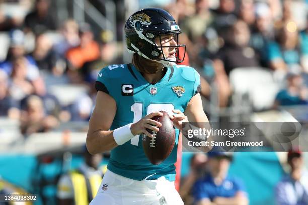 Trevor Lawrence of the Jacksonville Jaguars attempts a pass during the game against the Indianapolis Colts at TIAA Bank Field on January 09, 2022 in...