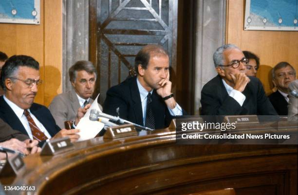 View of members of the US Senate Committee on Foreign Relations as they listen to testimony during a hearing, Washington DC, September 10, 1987....