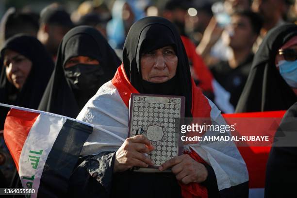 Supporters of Iraq's Sadrist movement gather outside the Swedish embassy in Baghdad on June 30, 2023 for a second day of protests against a Koran...