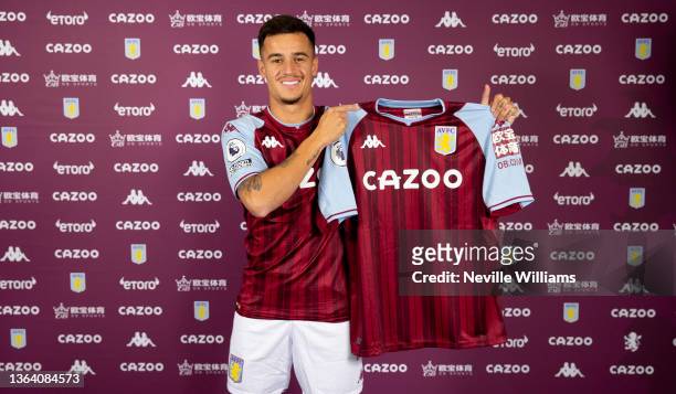 New loan signing Philippe Coutinho of Aston Villa poses for a picture at Bodymoor Heath training ground on January 11, 2022 in Birmingham, England.