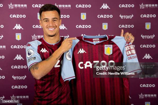 New loan signing Philippe Coutinho of Aston Villa poses for a picture at Bodymoor Heath training ground on January 11, 2022 in Birmingham, England.