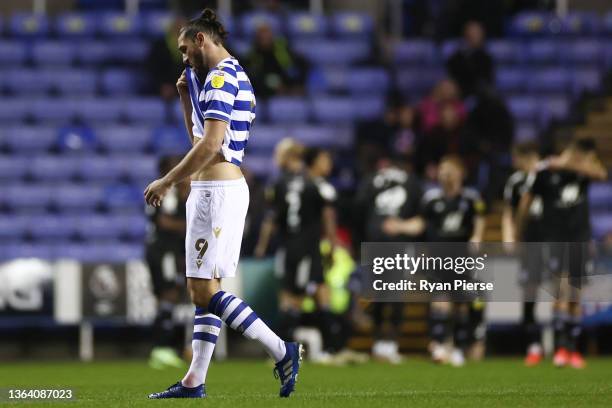 Andy Carroll of Reading looks dejected after Harry Wilson of Fulham scored his team's first goal during the Sky Bet Championship match between...