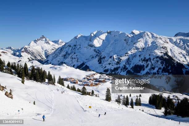 the famous ski-resort lech during winter - lech stock pictures, royalty-free photos & images