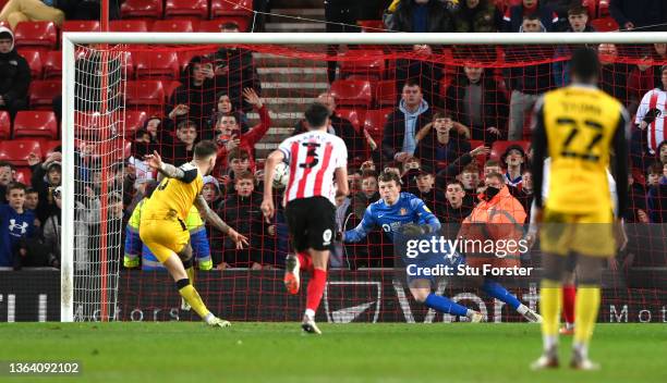 Lincoln player Chris Maguire scores his second goal from the penalty spot during the Sky Bet League One match between Sunderland and Lincoln City at...