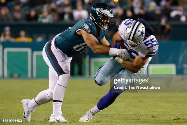 Leighton Vander Esch of the Dallas Cowboys returns an interception past Richard Rodgers of the Philadelphia Eagles at Lincoln Financial Field on...