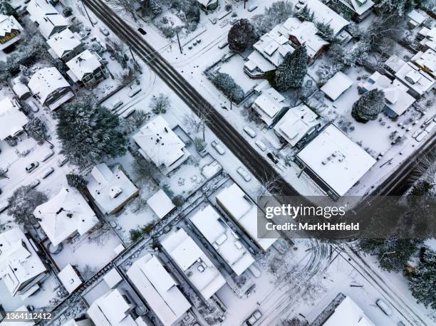 a plowed arterial stands out in seattle - seattle winter stock pictures, royalty-free photos & images