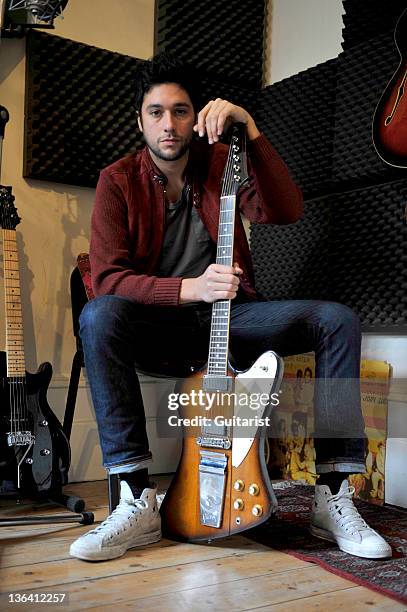 Sam Lewis Abc Portrait of British musician Sam Lewis posing with a Gibson Firebird ...