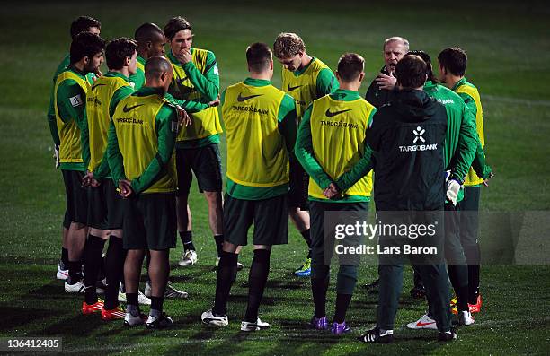 Head coach Thomas Schaaf gives instructions to his players during a training session at day one of Werder Bremen training camp on January 4, 2012 in...