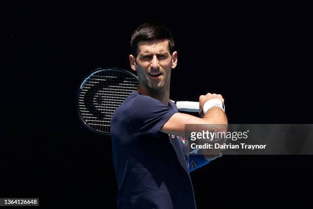 Novak Djokovic of Serbia plays a forehand shot during a practice session ahead of the 2022 Australian Open at Melbourne Park on January 12, 2022 in...