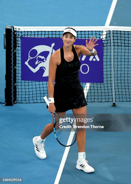 Garbine Muguruza of Spain celebrates match point in her match against Ekaterina Alexandrova of Russia during day four of the Sydney Tennis Classic at...