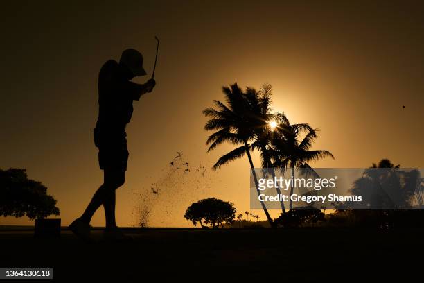 Harris English of the United States plays a shot on the 17th hole during a practice round prior to the Sony Open in Hawaii at Waialae Country Club on...