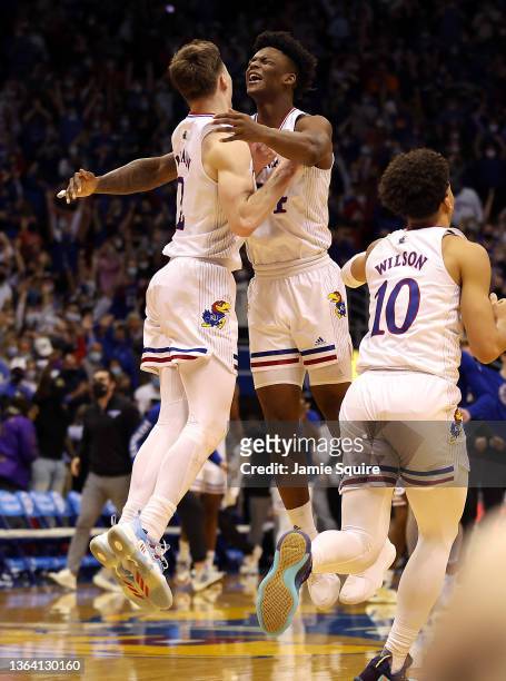 Adams and Christian Braun of the Kansas Jayhawks celebrate as the Jayhawks defeat the Iowa State Cyclones 62-61to win the game at Allen Fieldhouse on...