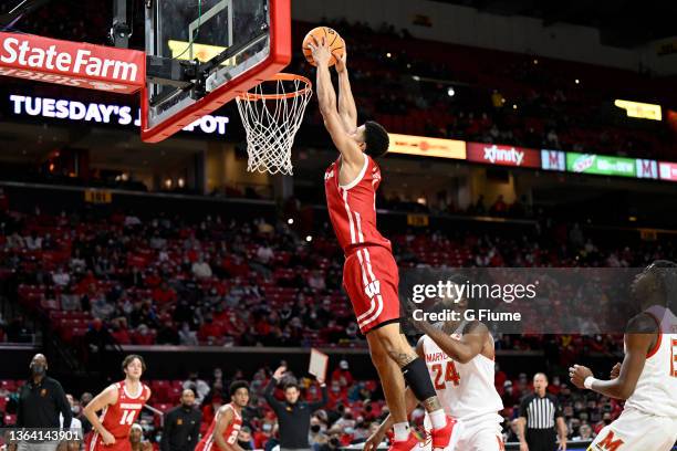 Johnny Davis of the Wisconsin Badgers dunks the ball against the Maryland Terrapins at Xfinity Center on January 09, 2022 in College Park, Maryland.