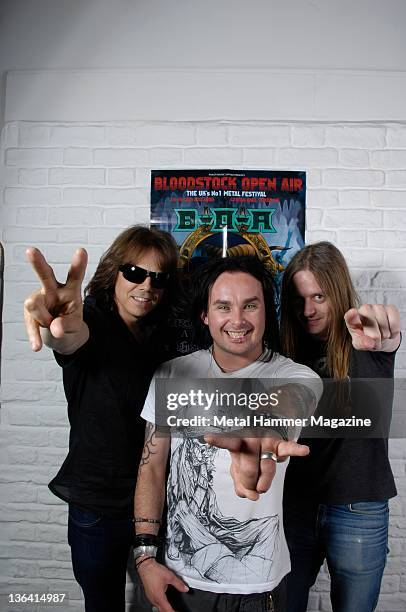 Joey Tempest, Dani Filth and Bill Steer, posing with a poster for Bloodstock Festival 2009. During a portrait shoot on June 24, 2009.