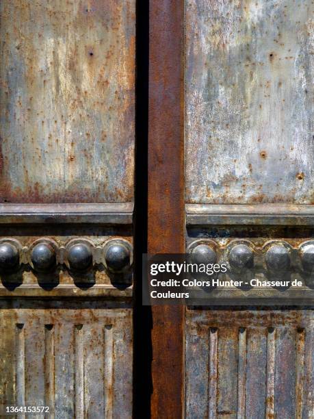 architectural features of an old rusty metal column of a new york building. - 1900 2013 stock pictures, royalty-free photos & images