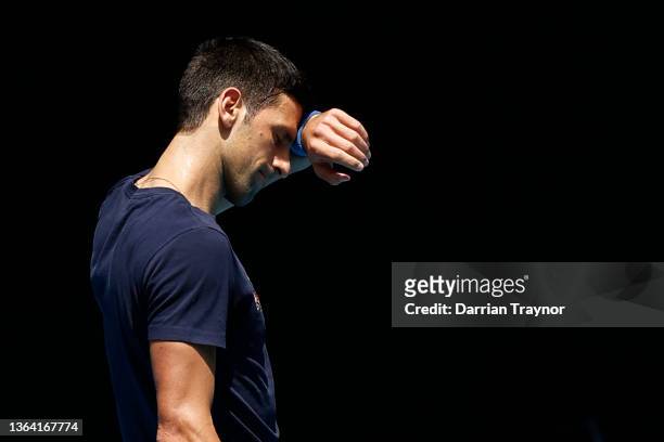 Novak Djokovic of Serbia is seen during a practice session ahead of the 2022 Australian Open at Melbourne Park on January 12, 2022 in Melbourne,...