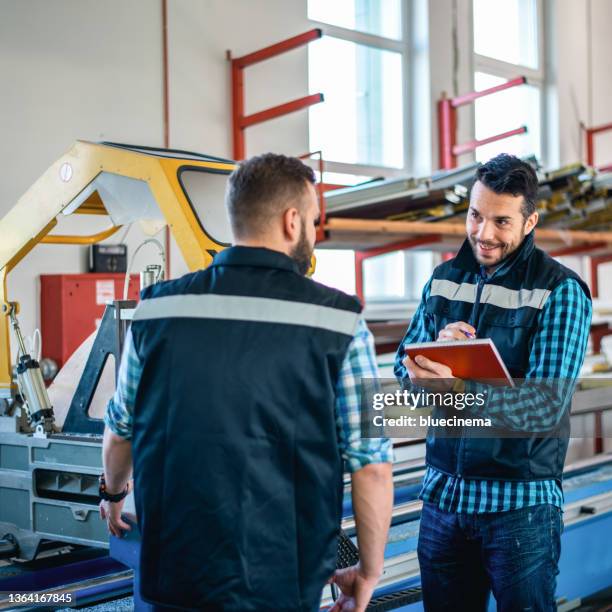 factory interiors for manufacturing pvc windows and doors - production line worker stock pictures, royalty-free photos & images