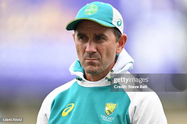 Justin Langer Head Coach of Australia watches on during an Australian Ashes squad nets session at Blundstone Arena on January 12, 2022 in Hobart,...