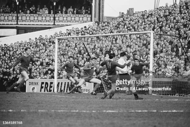 Leeds goalkeeper Gary Sprake , in centre, prepares to make a save during play in the League Division I match between Fulham and Leeds United at...