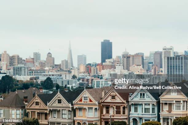 View of Painted Ladies houses with urban skyline