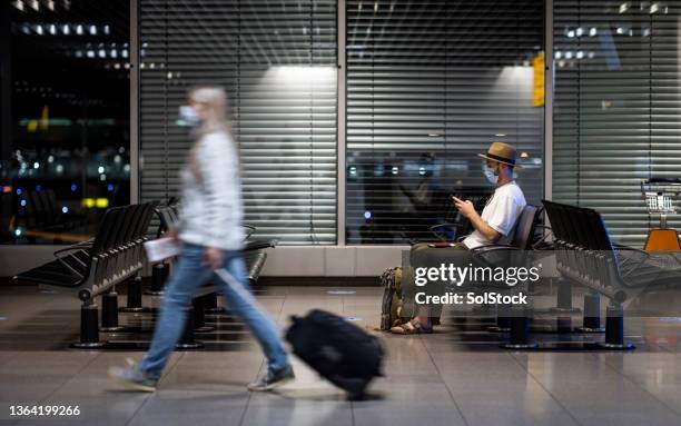waiting in the airport lounge - schiphol airport the netherlands stock pictures, royalty-free photos & images