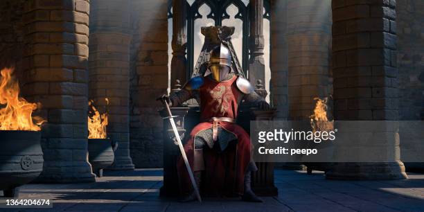 a knight in armour with sword sitting on throne in castle - tale of tales uk premiere vip arrivals stockfoto's en -beelden