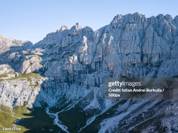 mountain landscape,scenic view of rocky mountains against clear sky,via caltene,cesiomaggiore,belluno,italy - iulian andrei stock-fotos und bilder