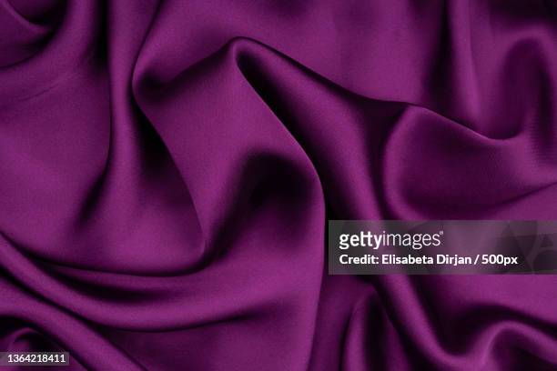 detailed glossy silk fabric texture background,full frame shot of purple fabric - silk ストックフォトと画像