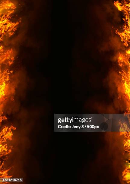 stock photo,low angle view of fire against sky at night - 火葬場 個照片及圖片檔