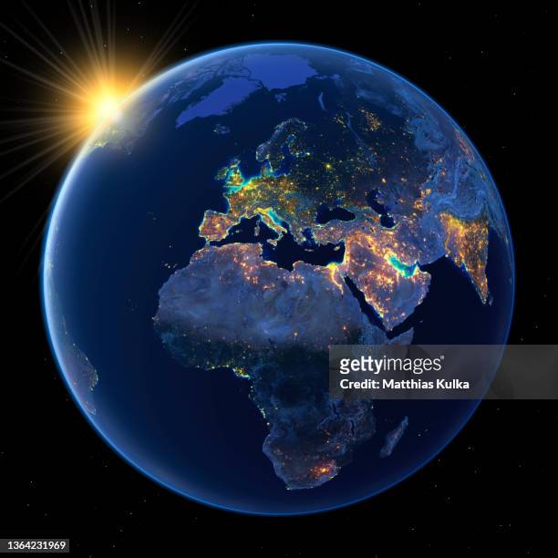 earth with sun shows europe, night lights on full earth with topographical relief - planet erde stockfoto's en -beelden