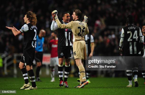 Newcastle goalkeeper Tim Krul and James Perch celebrate the third Newcastle goal during the Barclays Premier league game between Newcastle United and...
