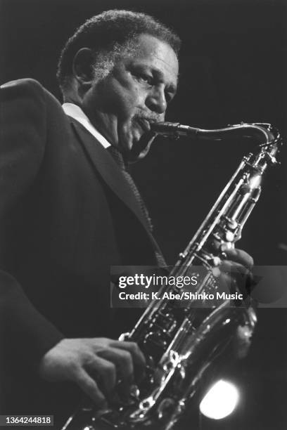 Dexter Gordon plays tenor saxophone In Dark Suits, Yamaha Hall, Tokyo, Japan, 24th March 1981.