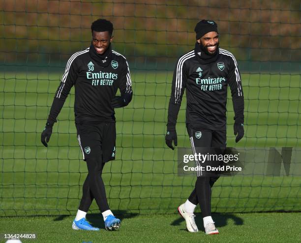 Eddie Nketiah and Alexandre Lacazette of Arsenal during the Arsenal training session at London Colney on January 12, 2022 in St Albans, England.