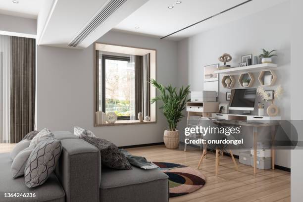 working at home. home office interior with wooden table, 
blank screen monitor, gray color sofa and garden view from the window. - empty small office stock pictures, royalty-free photos & images
