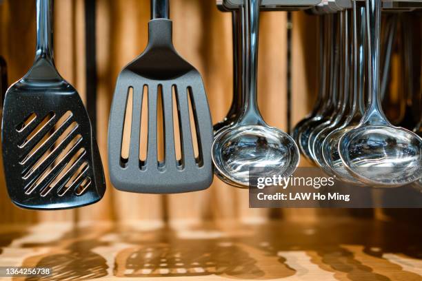 kitchenware in the supermarket - spatula stock pictures, royalty-free photos & images