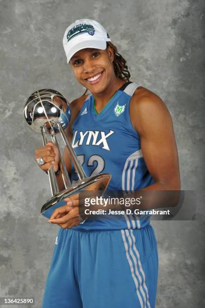 Rebekkah Brunson of the Minnesota Lynx poses for a portrait with the WNBA Trophy after defeating the Atlanta Dream in Game Three of the 2011 WNBA...