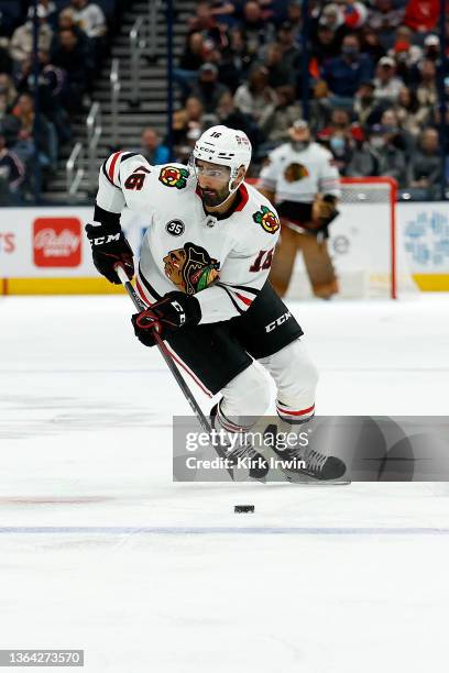 Jujhar Khaira of the Chicago Blackhawks controls the puck during the game against the Columbus Blue Jackets at Nationwide Arena on January 11, 2022...