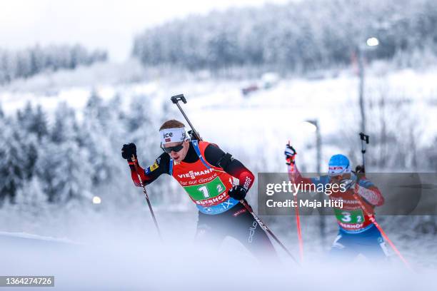 Johannes Thingnes Boe of Norway and Alexander Povarnitsyn of Russia compete during the Relay Mixed at the IBU World Cup Biathlon Oberhof at Biathlon...