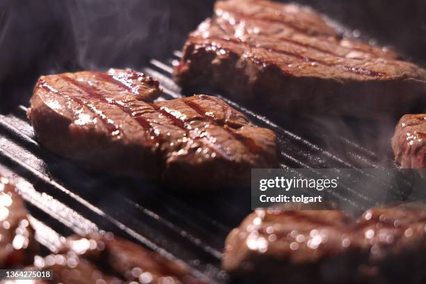 cooking beef steaks - red meat stock pictures, royalty-free photos & images