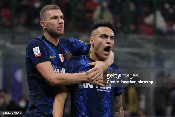 Lautaro Martinez of FC Internazionale celebrates with team mates after scoring to level the game at 1-1 during the Italian SuperCup match between FC...