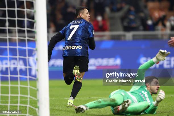 Alexis Sanchez of Inter Milan celebrates after scoring their side's second goal during the Italian Supercup match between Inter and Juventus at The...