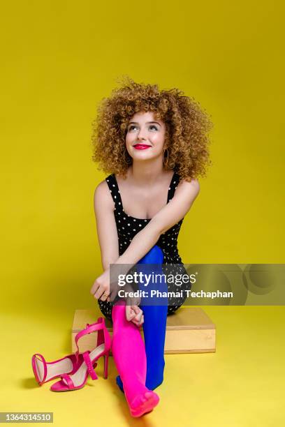 happy teenage girl - girl in yellow dress stock pictures, royalty-free photos & images