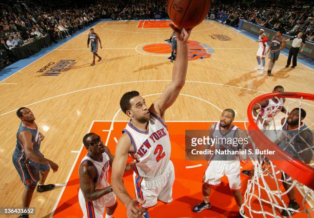 Landry Fields of the New York Knicks takes a shot during the game against the Charlotte Bobcats on January 4, 2012 at Madison Square Garden in New...