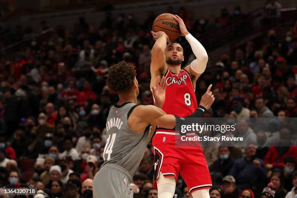 Zach LaVine of the Chicago Bulls shoots over Kessler Edwards of the Brooklyn Nets during the first half of a game at United Center on January 12,...