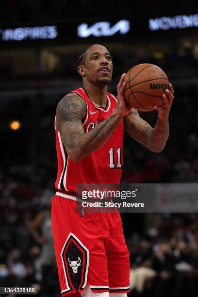DeMar DeRozan of the Chicago Bulls shoots a free throw during the first half of a game against the Brooklyn Nets at United Center on January 12, 2022...