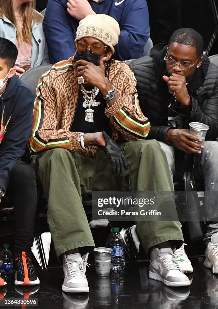 Rapper 2 Chainz attends the game between the Miami Heat and the Atlanta Hawks at State Farm Arena on January 12, 2022 in Atlanta, Georgia.